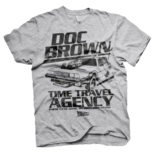 Grå T-shirt med et vintage-look, der viser DeLorean-bilen og teksten Doc Brown Time Travel Agency samt citatet "Where we're going, we don't need roads".